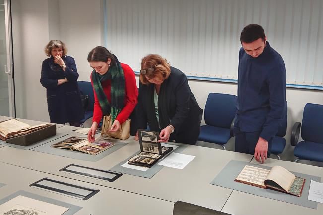 Joshua Burns and family viewing the archives